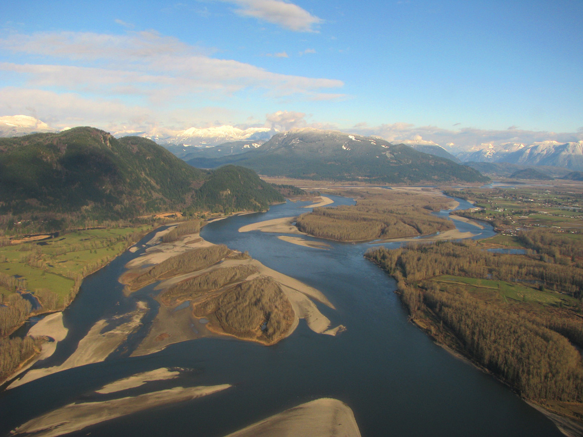 Photo of the large Fraser River and its vast gravel beds and side channels.