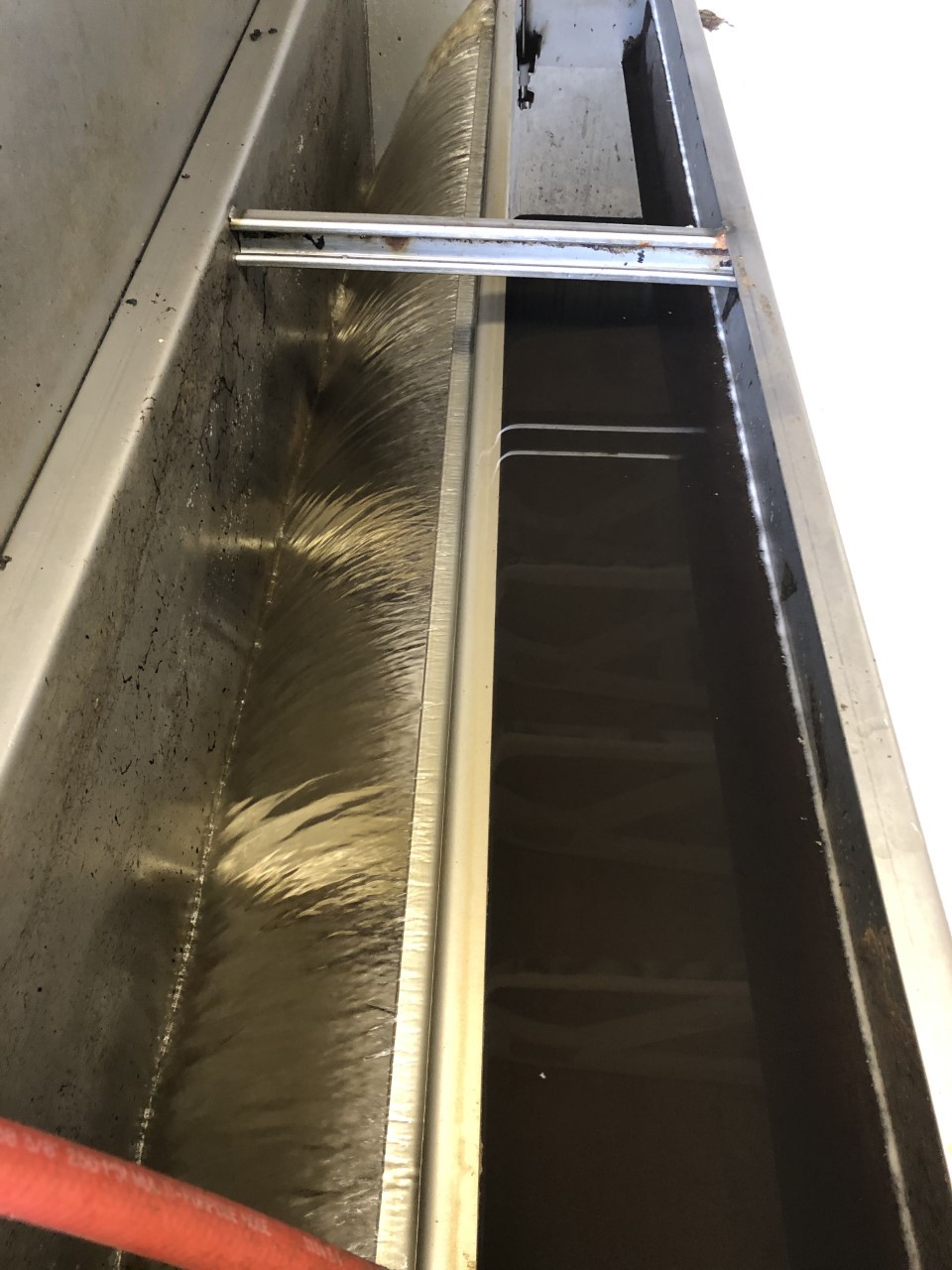 Installation of an advanced oxidation process to remove color and solids from wastewater and the clear effluent discharge