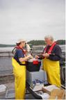 Examination and enumeration of sea lice on hook and line caught Atlantic salmon on salmon net pen site.