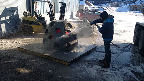 Finishing up the creation of an artificial reef dome. These domes were used to restore the habitat for sea life in Placentia Bay, Newfoundland.