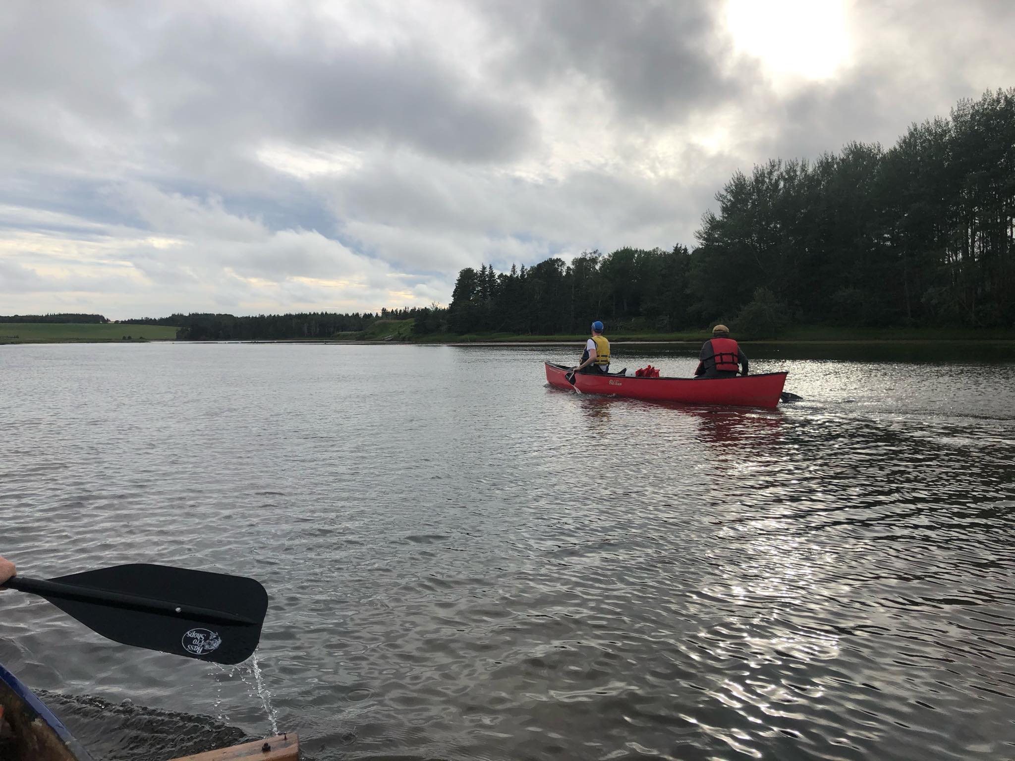 DFO employees canoeing at Basin Head. ©Souris and Area Branch of the PEI Wildlife Federation.