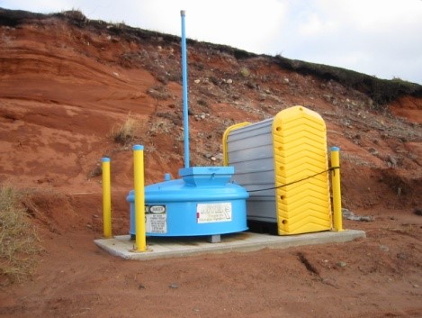 Outdoor used oil tank installation with proper protection from vehicle impacts (bollards)