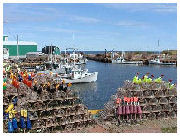 Seacow Pond Harbour with lobster traps on the wharves.