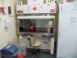 A biological safety cabinet, which is a specialized containment structure used when manipulating infectious materials. Source: Fisheries and Oceans Canada.